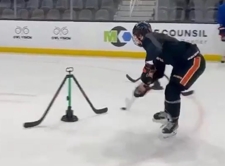 Potent Spin Defender 2.0 â App-Powered Rotating Hockey Defense Training System